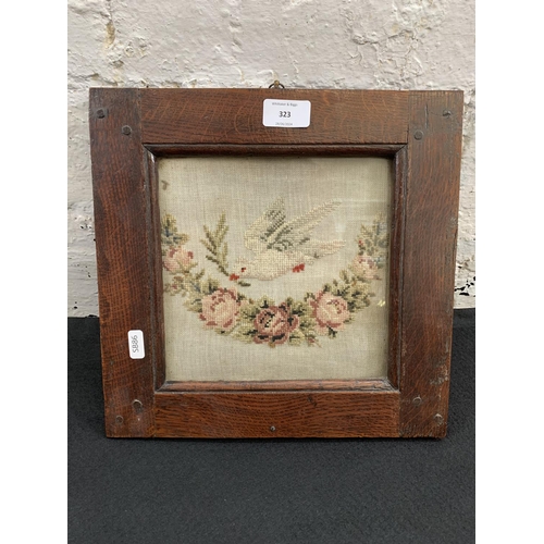 323 - A19th century oak framed cross stitch tapestry - approx. 30cm high x 31cm wide