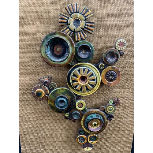 324 - A mid 20th century ceramic abstract wall sculpture - approx. 53cm high x 36cm wide