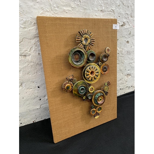 324 - A mid 20th century ceramic abstract wall sculpture - approx. 53cm high x 36cm wide