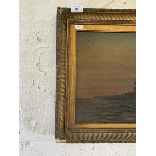 329 - An early 20th century gilt framed oil on canvas of a war ship, signed and dated 1918 - approx. 45cm ... 