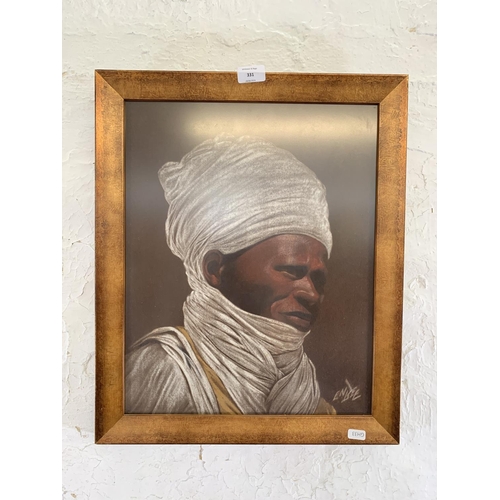 331 - A framed fabric portrait painting of an African gentleman, signed lower right - approx. 52cm high x ... 