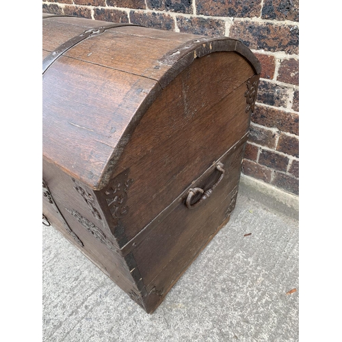 34 - An 18th century German oak and metal banded dome top chest with lower drawer - approx. 79cm high x 1... 