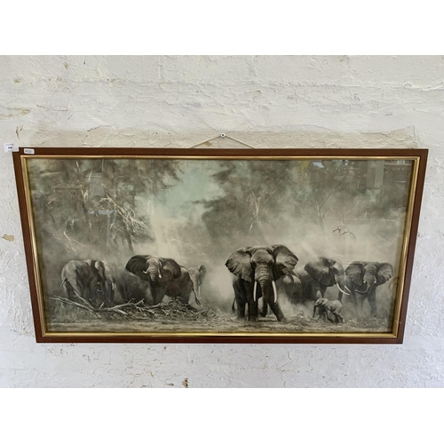 344 - A framed David Shepherd elephants print - approx. 55cm high x 106cm wide