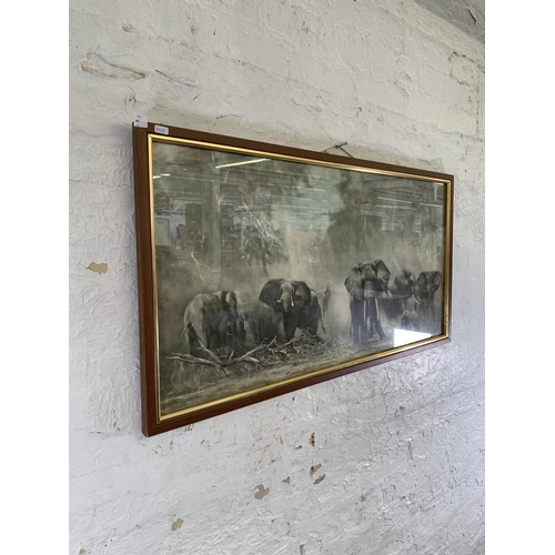 344 - A framed David Shepherd elephants print - approx. 55cm high x 106cm wide