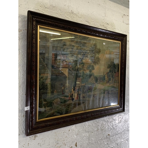 353 - An early 20th century framed print of a village scene, signed J. Cook - approx. 74cm high x 100cm wi... 