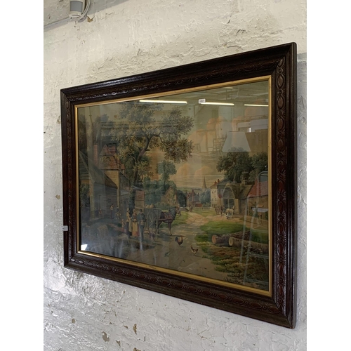 353 - An early 20th century framed print of a village scene, signed J. Cook - approx. 74cm high x 100cm wi... 