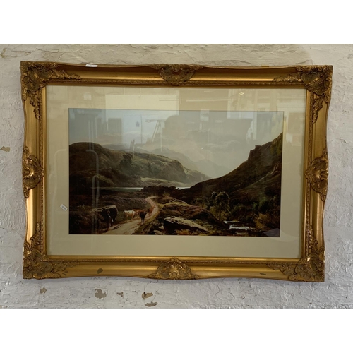 354 - A gilt framed landscape print - approx. 68cm high x 105cm wide