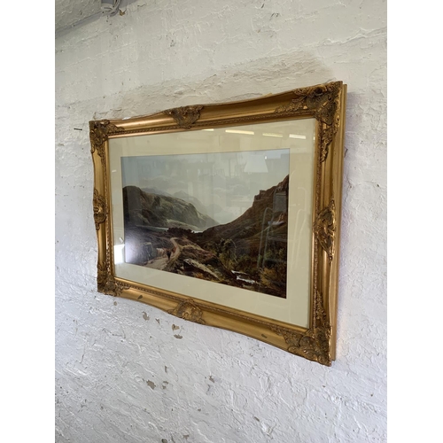 354 - A gilt framed landscape print - approx. 68cm high x 105cm wide