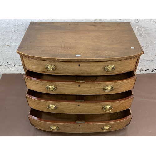 40 - A George III inlaid mahogany bow fronted chest of drawers with fitted interior - approx. 73cm high x... 