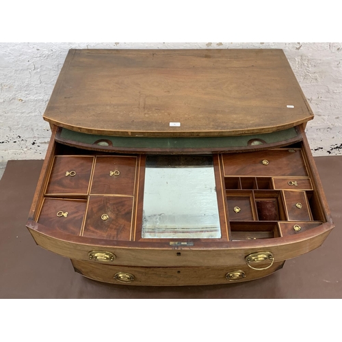 40 - A George III inlaid mahogany bow fronted chest of drawers with fitted interior - approx. 73cm high x... 