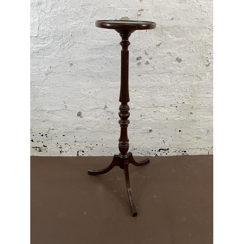 41 - A 19th century style mahogany circular top tripod jardinière stand - approx. 100cm high x 27cm diame... 