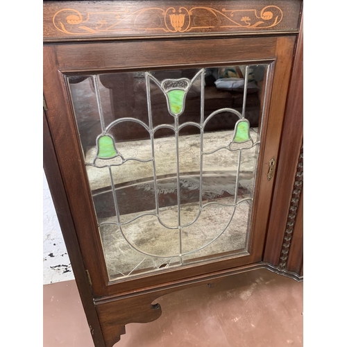 44 - An Art Nouveau inlaid mahogany and lead glass display cabinet - approx. 206cm high x 138cm wide x 43... 