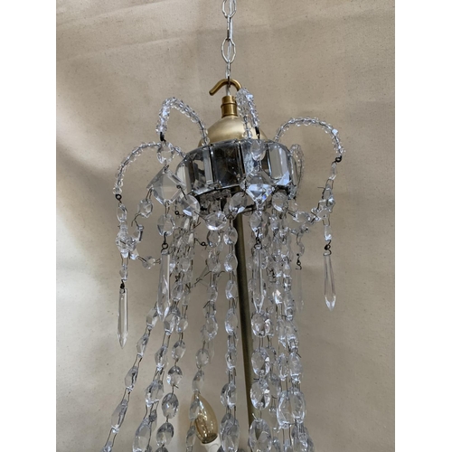 46 - A mid 20th century crystal four branch chandelier with droplets - approx. 65cm high