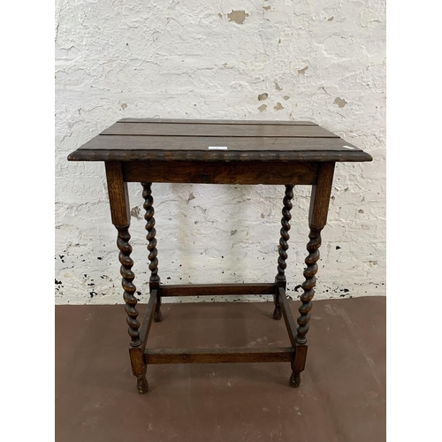 47 - An early 20th century oak pie crust edge side table on barley twist supports - approx. 72cm high x 6... 