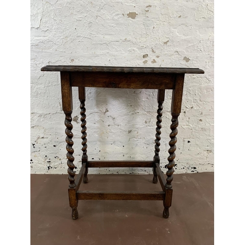 47 - An early 20th century oak pie crust edge side table on barley twist supports - approx. 72cm high x 6... 