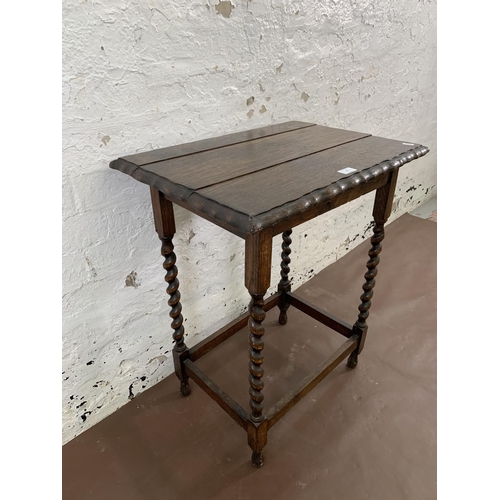 47 - An early 20th century oak pie crust edge side table on barley twist supports - approx. 72cm high x 6... 