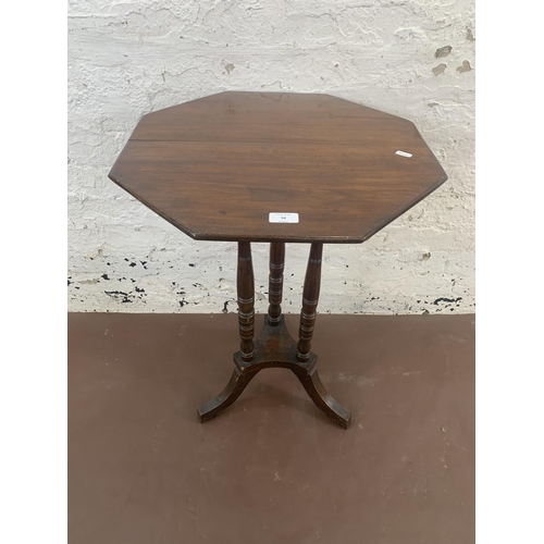 54 - A late 19th/early 20th century mahogany octagonal tilt top tripod side table - approx. 72cm high x 5... 