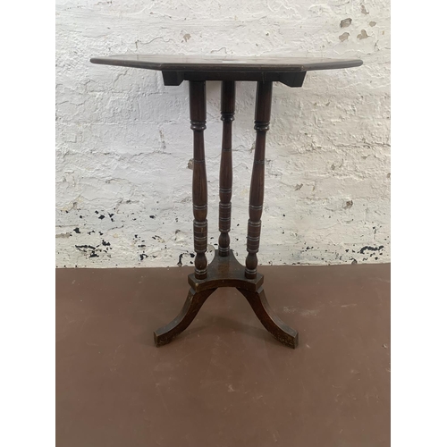 54 - A late 19th/early 20th century mahogany octagonal tilt top tripod side table - approx. 72cm high x 5... 