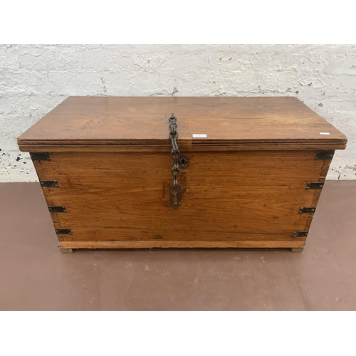 60 - A 19th century camphor wood and metal banded blanket box - approx. 45cmhigh x 90cm wide x 42cm deep