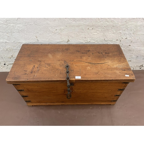 60 - A 19th century camphor wood and metal banded blanket box - approx. 45cmhigh x 90cm wide x 42cm deep