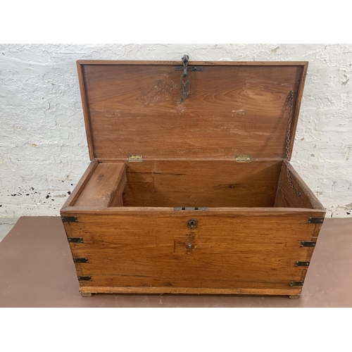 60 - A 19th century camphor wood and metal banded blanket box - approx. 45cmhigh x 90cm wide x 42cm deep