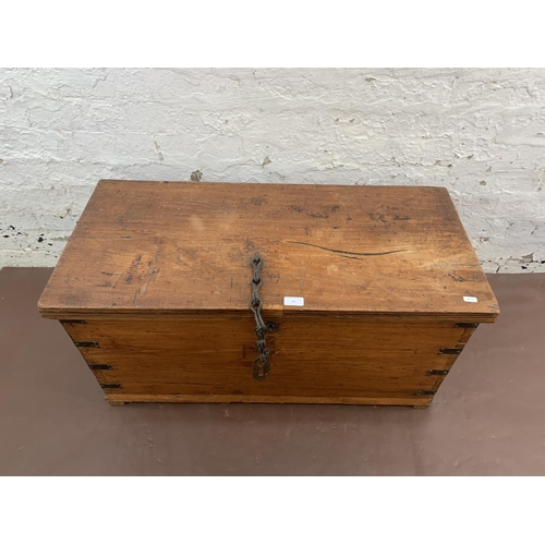 60 - A 19th century camphor wood and metal banded blanket box - approx. 45cmhigh x 90cm wide x 42cm deep