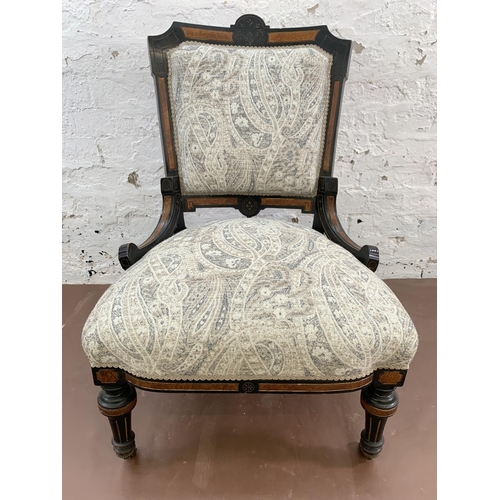 64 - A 19th Century Aesthetic Movement ebonised and burr walnut framed fabric upholstered bedroom chair -... 