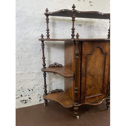 69 - A Victorian walnut four tier chiffonier/whatnot stand - approx. 107cm high x 104cm wide x 36cm deep