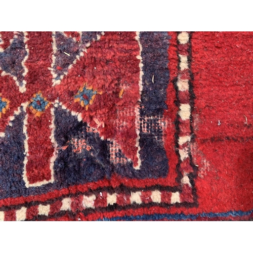 7 - A 20th century Kashqai rug - approx. 260cm x 168cm