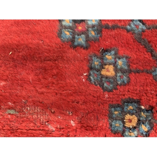 7 - A 20th century Kashqai rug - approx. 260cm x 168cm