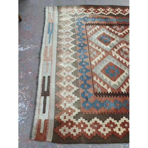 8 - A mid 20th century Kilim rug - approx. 225cm x 168cm