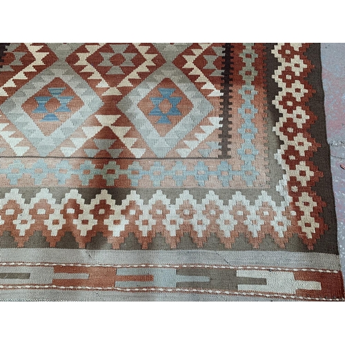 8 - A mid 20th century Kilim rug - approx. 225cm x 168cm