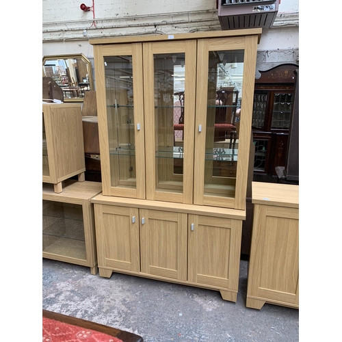 80 - A Woodberry Bros & Haines Ltd oak effect display cabinet - approx. 194cm high x 121cm wide x 40cm de... 