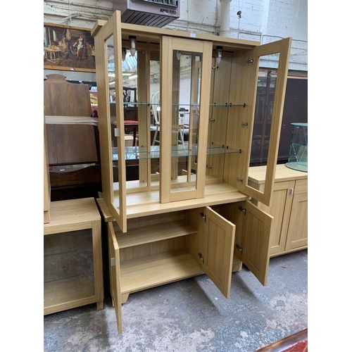 80 - A Woodberry Bros & Haines Ltd oak effect display cabinet - approx. 194cm high x 121cm wide x 40cm de... 