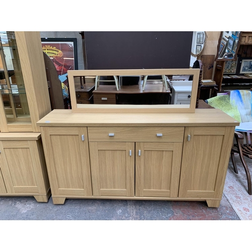 81 - Two pieces of oak effect furniture, one Woodberry Bros & Haines Ltd sideboard - approx. 89cm high x ... 