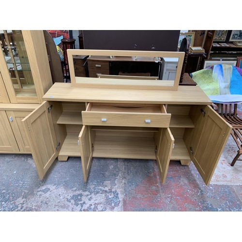 81 - Two pieces of oak effect furniture, one Woodberry Bros & Haines Ltd sideboard - approx. 89cm high x ... 