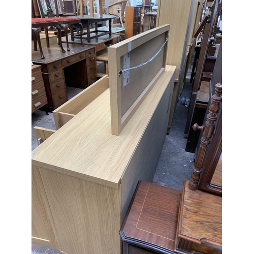 81 - Two pieces of oak effect furniture, one Woodberry Bros & Haines Ltd sideboard - approx. 89cm high x ... 