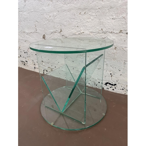 82 - A contemporary glass circular side table - approx. 42cm high x 45cm diameter