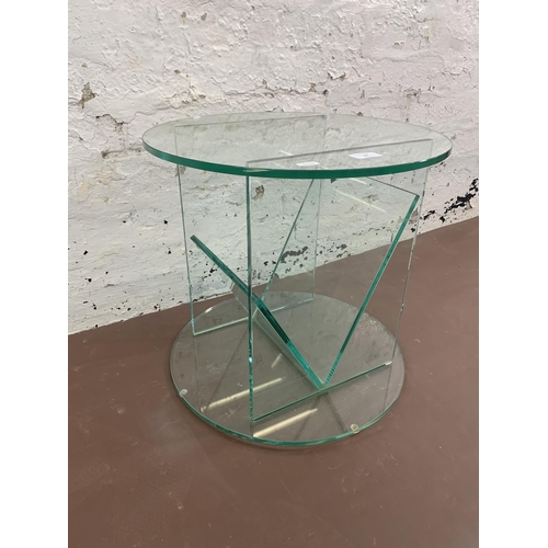 82 - A contemporary glass circular side table - approx. 42cm high x 45cm diameter