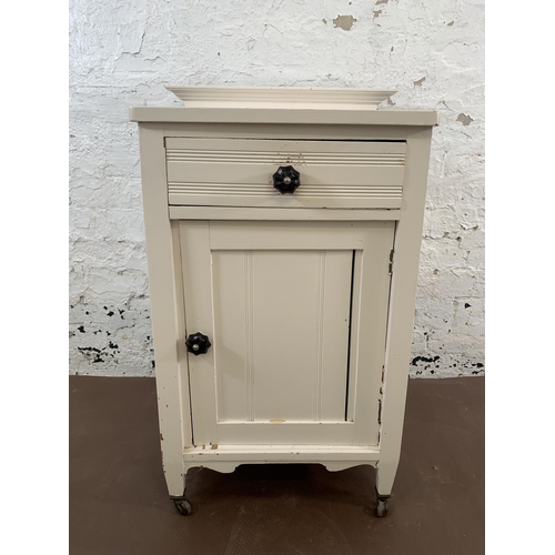 83 - A late 19th/early 20th century white painted satinwood bedside cabinet - approx. 84cm high x 55cm wi... 