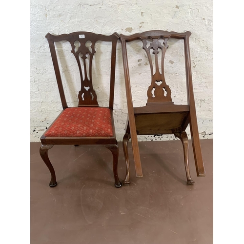 85 - A pair of late 19th/early 20th century carved mahogany and fabric upholstered dining chairs