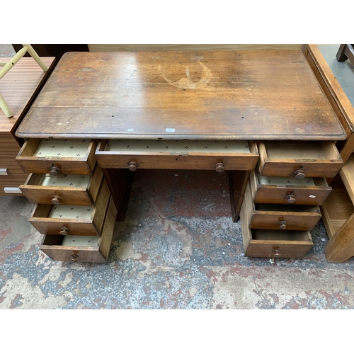 86 - A Victorian oak twin pedestal writing desk - approx. 75cm high x 142cm wide x 76cm deep