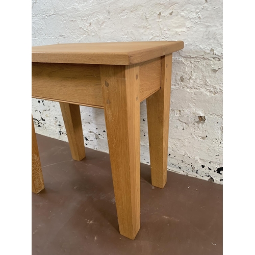 87A - A modern solid oak rectangular side table - approx. 50cm high x 33cm wide x 50cm long