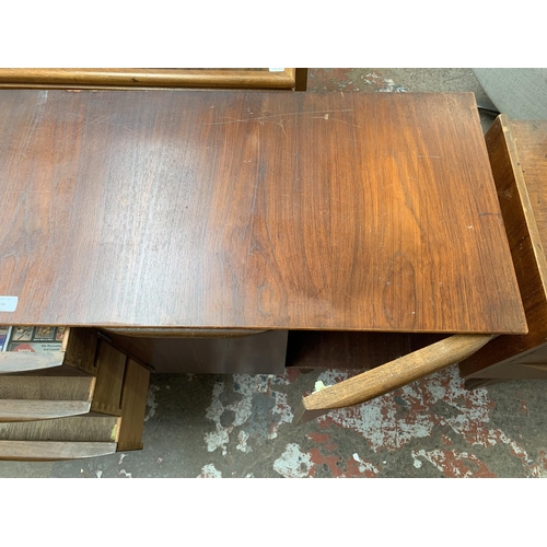 96 - A mid 20th century teak sideboard - approx. 74cm high x 137cm wide x 43cm deep