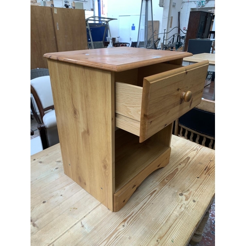 99 - A modern pine bedside cabinet - approx. 60cm high x 49cm wide x 39cm deep