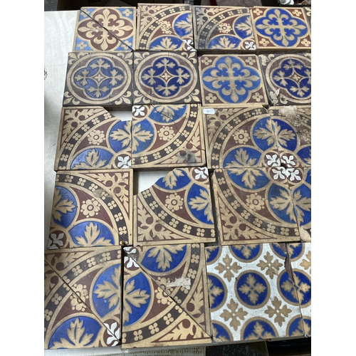 500 - A collection of 19th century Minton Augustus Pugin gothic revival church floor tiles - approx. 15cm ... 