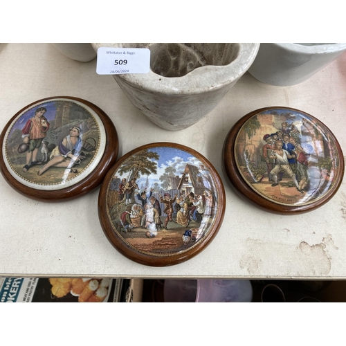 509 - Ten pieces of 19th century pottery to include three Staffordshire Prattware ceramic pot lids to incl... 