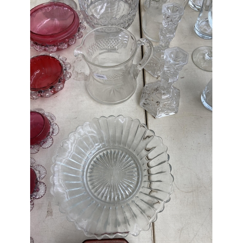 510 - A collection of antique and later glassware to include Edwardian decanter, five pieces of cranberry ... 