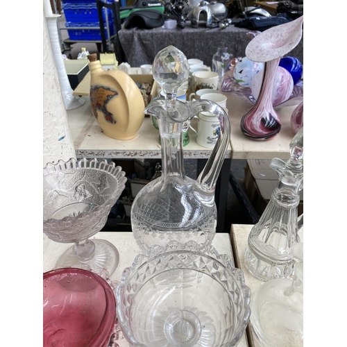 510 - A collection of antique and later glassware to include Edwardian decanter, five pieces of cranberry ... 