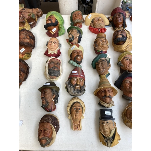 517 - Approx. eighty vintage Bossons chalkware head wall masks to include Chef, Spanish Lady, Snake charme... 